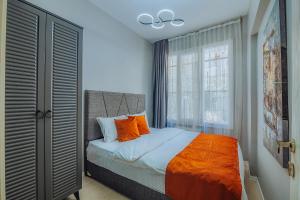 Posteľ alebo postele v izbe v ubytovaní Taksim Wonder Suites
