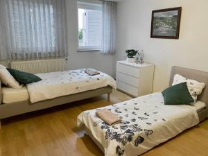Katil atau katil-katil dalam bilik di Cosy Room in Remich
