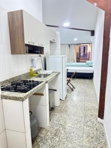 Dapur atau dapur kecil di Loft dos anjos +18 gambar