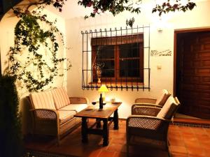 a living room with two chairs and a coffee table at LagoVista45 in Torrevieja