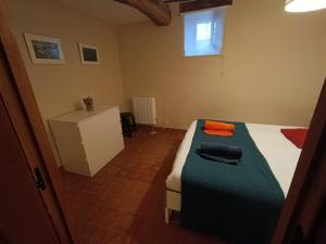 Łóżko lub łóżka w pokoju w obiekcie Vivienda turística La Magdalena
