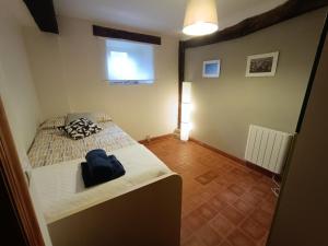 Łóżko lub łóżka w pokoju w obiekcie Vivienda turística La Magdalena