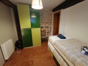 Łóżko lub łóżka w pokoju w obiekcie Vivienda turística La Magdalena