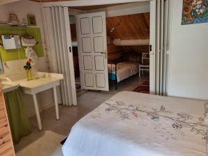 Η κουζίνα ή μικρή κουζίνα στο Chambres à l'Orée du bois +7 φωτογραφίες