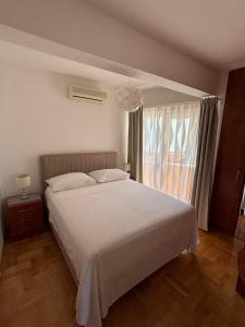Ein Bett oder Betten in einem Zimmer der Unterkunft Villa Spomenka