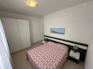 Posteľ alebo postele v izbe v ubytovaní Residence Orate - Agenzia Cocal