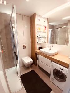 Ένα μπάνιο στο PRZY PLAŻY APARTAMENT 306 Porta Mare