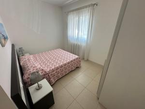 Posteľ alebo postele v izbe v ubytovaní Residence Orate - Agenzia Cocal