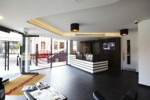 a living room with a view of a building at The Whitechapel in London