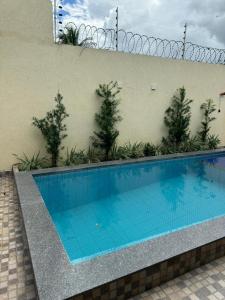 Het zwembad bij of vlak bij Linda casa com 3 quartos e piscina