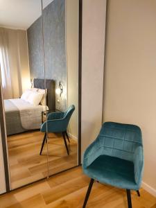 Postel nebo postele na pokoji v ubytování Agape Charme Rooms