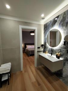 Postel nebo postele na pokoji v ubytování Agape Charme Rooms