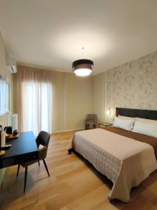 Postel nebo postele na pokoji v ubytování Agape Charme Rooms