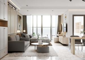 uma sala de estar com um sofá e uma mesa em Landmark 81 and Vinhomes Riverside Residence em Ho Chi Minh