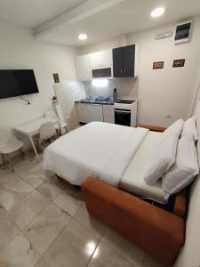 Η κουζίνα ή μικρή κουζίνα στο Lucky Apartments