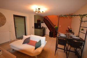 Posezení v ubytování Logement cosy et moderne