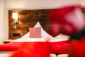 Rúm í herbergi á Hotel Tradizio