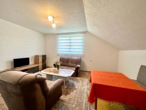 Posezení v ubytování Apartman Quince