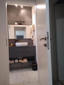 a bathroom with a sink and a mirror at Apartment Erceg in Poreč +79 photos