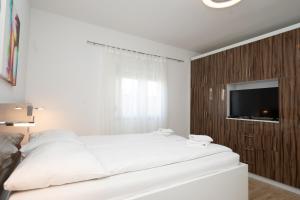 Postel nebo postele na pokoji v ubytování Holiday Home Luka Pridraga