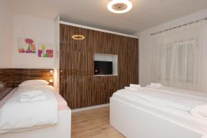 Postel nebo postele na pokoji v ubytování Holiday Home Luka Pridraga