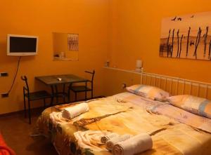 Postel nebo postele na pokoji v ubytování B&B da Cinzia