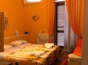 Postel nebo postele na pokoji v ubytování B&B da Cinzia