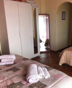 Postel nebo postele na pokoji v ubytování B&B da Cinzia