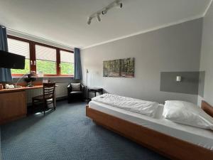 Postel nebo postele na pokoji v ubytování Hotel & Restaurant Prüser´s Gasthof + 37 fotografií