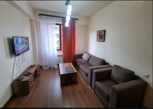 TV a/nebo společenská místnost v ubytování Akhalkalaki Guest house Malparido