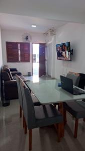 Μια τηλεόραση ή/και κέντρο ψυχαγωγίας στο ViVa feliz casa temporada +5 φωτογραφίες