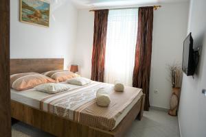 Un pat sau paturi într-o cameră la Lavanda home