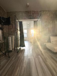 a room with a bedroom with a bed and a mirror at 3 bedroom Condo in Central Park/ Times Square/ Hudson Yards in New York