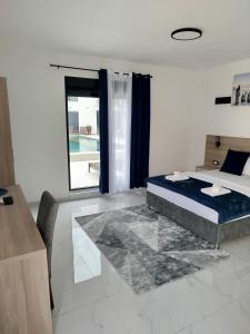Postel nebo postele na pokoji v ubytování Apartman Vito