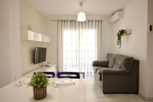 Televízia a/alebo spoločenská miestnosť v ubytovaní Bonito apartamento cerca de la playa de Torrox