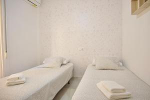 Posteľ alebo postele v izbe v ubytovaní Bonito apartamento cerca de la playa de Torrox