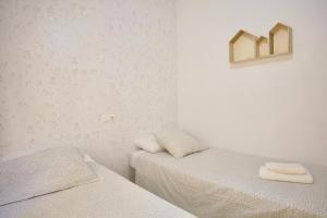 Posteľ alebo postele v izbe v ubytovaní Bonito apartamento cerca de la playa de Torrox