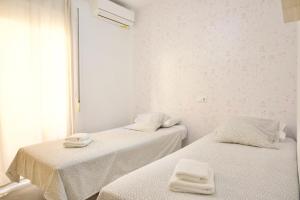 Posteľ alebo postele v izbe v ubytovaní Bonito apartamento cerca de la playa de Torrox