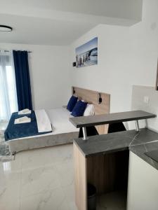 Postel nebo postele na pokoji v ubytování Apartman Vito + 8 fotografií