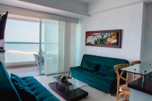 Svetainės erdvė apgyvendinimo įstaigoje Playa Cartagena Apartments