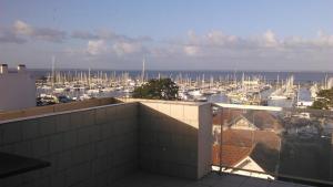 a view of a marina with boats in the water at Hôtel Le Nautic in Arcachon