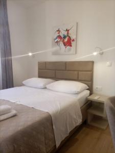 Postel nebo postele na pokoji v ubytování Marjan apartment & rooms