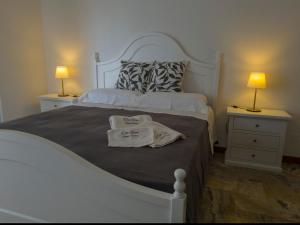 Giường trong phòng chung tại GUEST HOUSE DA GINO +23 ảnh