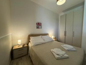 Posteľ alebo postele v izbe v ubytovaní Villa Elemiri