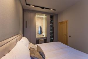 Ένα ή περισσότερα κρεβάτια σε δωμάτιο στο Apartament Ułański - City Park