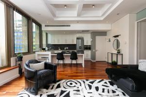 Kuchyň nebo kuchyňský kout v ubytování #603 Cartwright - The Nighthawk