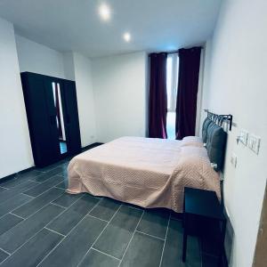 Postel nebo postele na pokoji v ubytování Esterina Rooms
