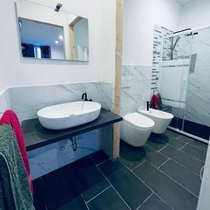 Koupelna v ubytování Esterina Rooms
