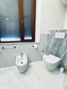 Koupelna v ubytování B&B Hèlios
