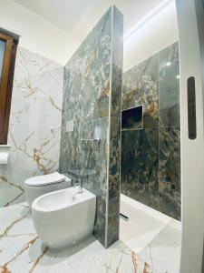 Koupelna v ubytování B&B Hèlios